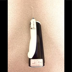 WaterPik Waterflosser. Used, good condition, works very well.
